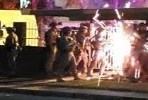 Border Patrol Agents cut through steel bars during raid of a cartel "stash house" for illegal aliens in Arizona. Border Patrol Agents cut through steel bars during raid of a cartel "stash house" for illegal aliens in Arizona.