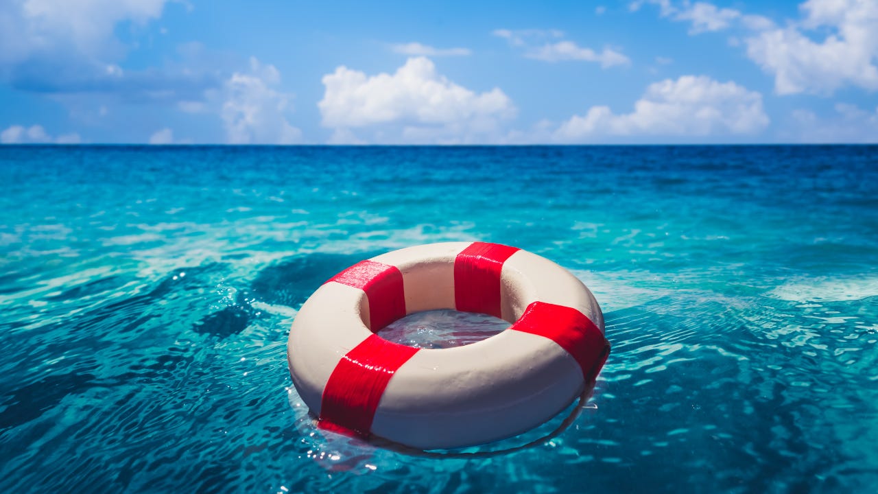 A life preserver floating in the ocean.