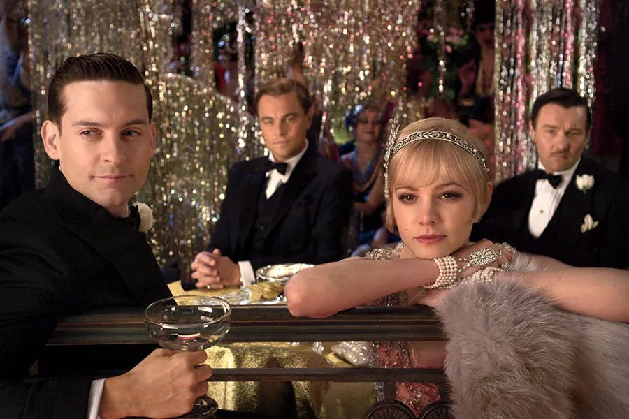 Nick Carroway, Gatsby, Tom, and Daisy in the 2013 The Great Gatsby.