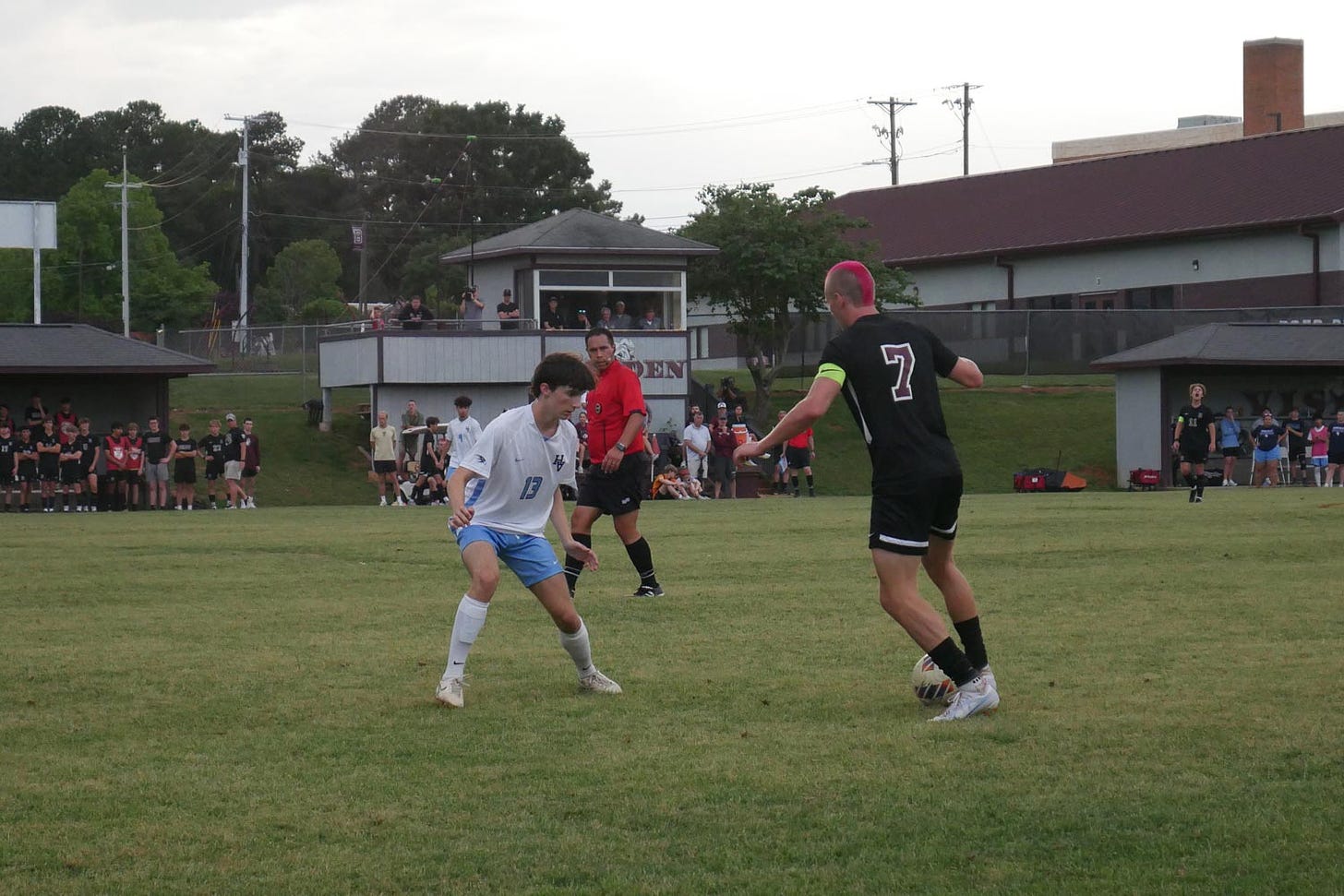Bearden and Hardin Valley boys soccer players compete for a ball.