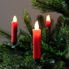 Create a wonderfully nostalgic look this Christmas with our set of 20 traditional red candle tree lights. Each candle clip measures 4 in height and has one flickering LED bulb nestled within its flame-shaped cap for a truly realistic, candlelit glow. The LEDs remain cool, making them incredibly safe and perfect for decorating festive foliage or fir trees. Simply insert 1 x AAA battery into each candle and set to the handy timer for automatic illumination at the same time each day or use the hand