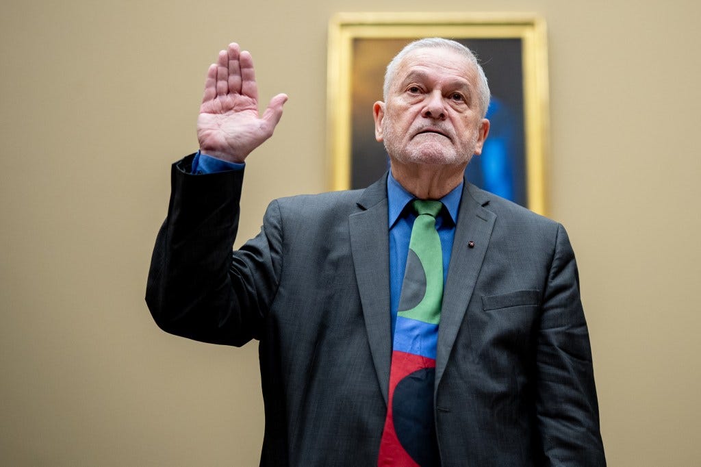 Dr. David Morens being sworn in at a House Select Subcommittee on the Coronavirus Pandemic hearing at Capitol Hill, raising his hand