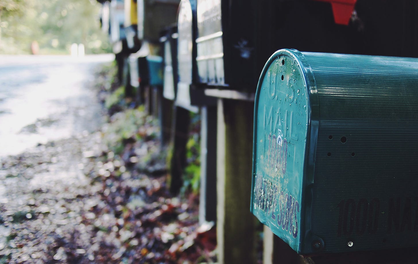 Series of letterboxes by the road