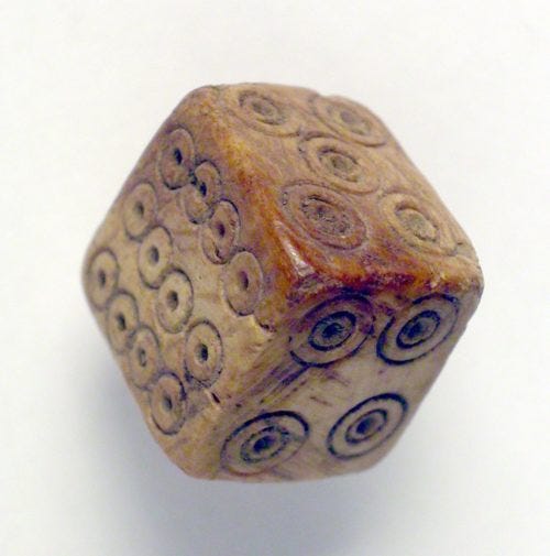 Photo of an ancient stone die