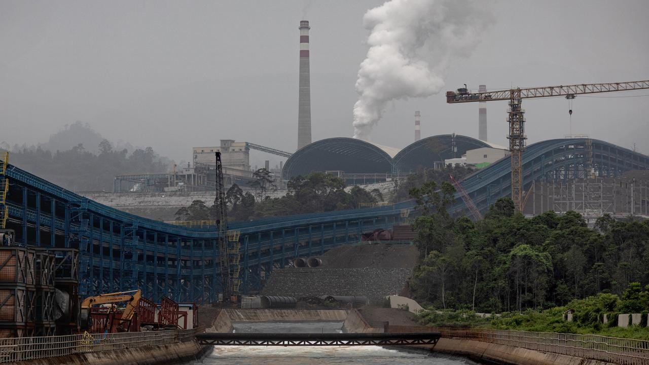 The belching chimneys of Indonesia Morowali Industrial Park. Picture: Garry Lotulung