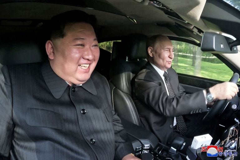 Putin and Kim take each other for a spin in Aurus limousine | Politics News  | Al Jazeera