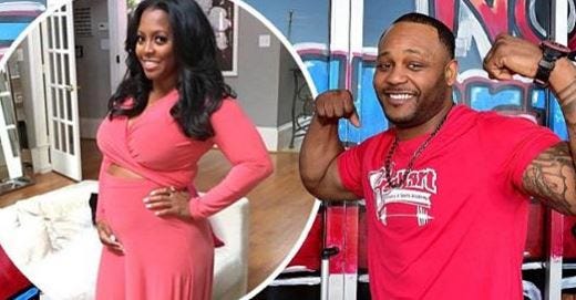 keisha knigh pulliam showing off belly