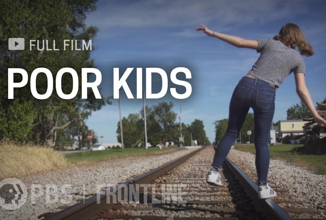Screenshot from Frontline documentary 'Poor Kids': A tween girl in jeans and a grey T-shirt balances on one foot as she walks on a railroad track in a small midwestern town