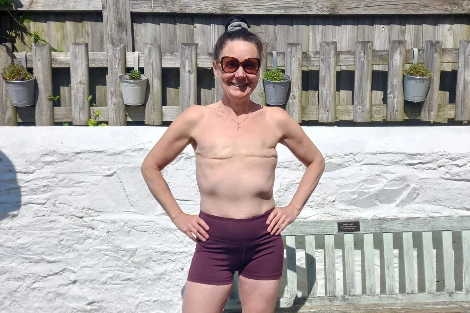 Louise Butcher, post-double mastectomy, in all of her running gear (just shorts).