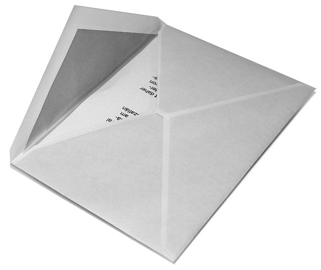 Photo of an open envelope with a letter inside