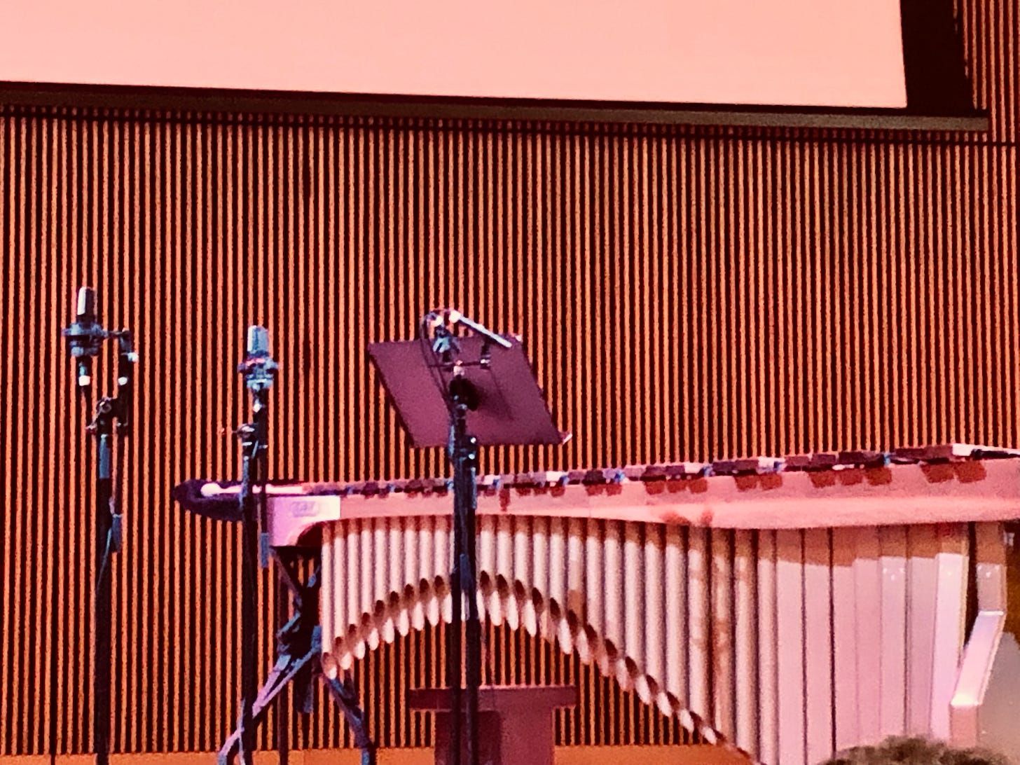 Close-up of microphones, drum, and 5-octave marimba, before the performers walked on stage.