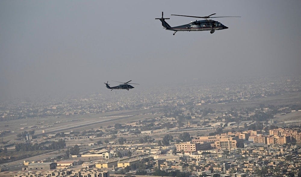 US State Department Sikorsky HH-60L Black Hawk helicopters escort Secretary of State Antony Blinken as they fly over Baghdad towards the US embassy headquarters on Friday, Dec. 13, 2024. (AP) US State Department Sikorsky HH-60L Black Hawk helicopters escort Secretary of State Antony Blinken as they fly over Baghdad towards the US embassy headquarters on Friday, Dec. 13, 2024. (AP)