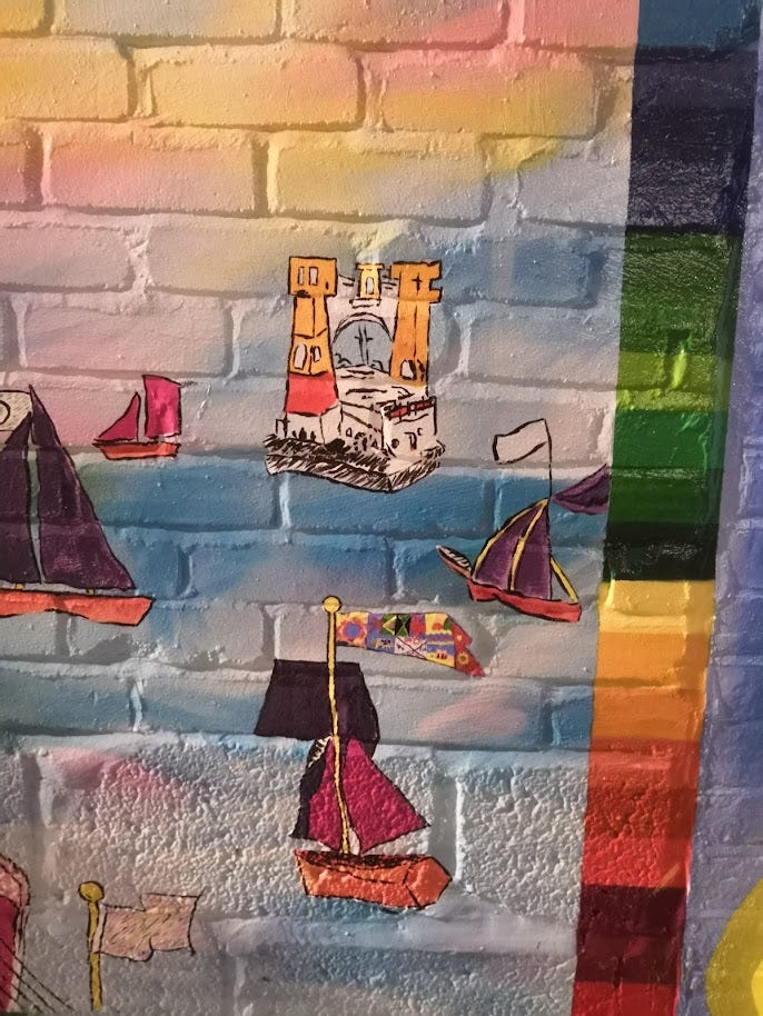 Mural with naive multicoloured illustrations of ships