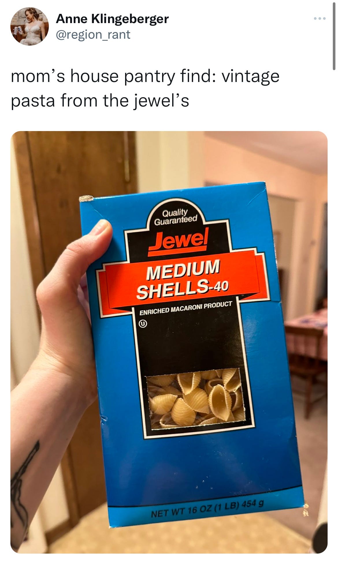 tweet from anne klingeberger @region_rant that says mom's house pantry find: vintage pasta from the jewel's and features an image of a blue, very old jewel osco box with macaroni shells still in it. they look normal, no mold
