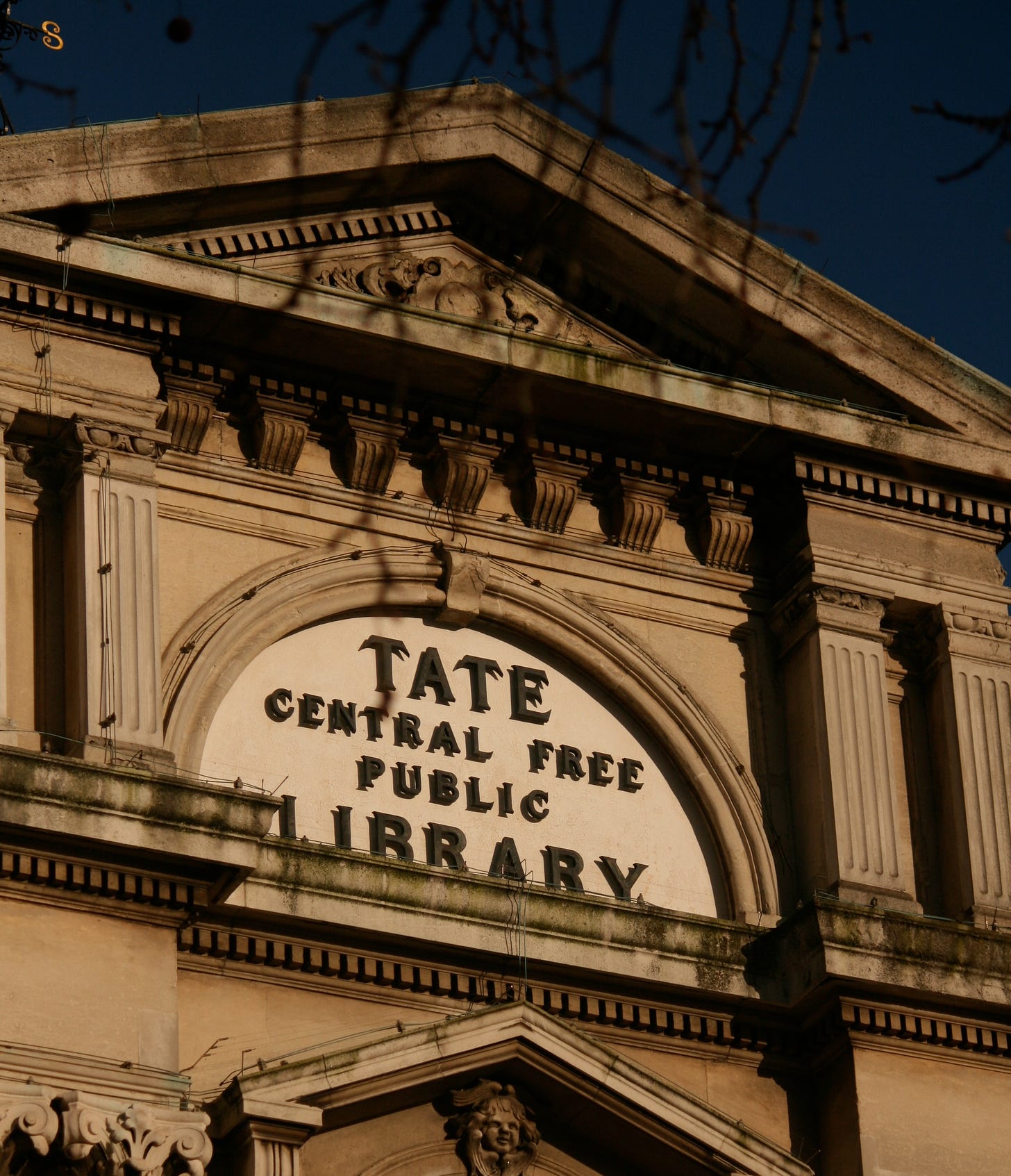 Photo of the front of Brixton Library with words 'Tate Central Free Public Library'