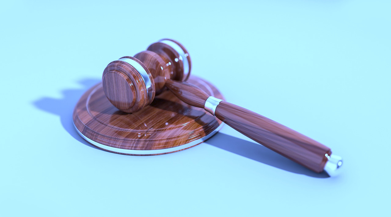Gavel with blue background