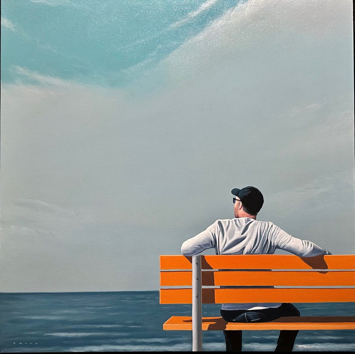 A person sitting on a bench looking out to the ocean

Description automatically generated