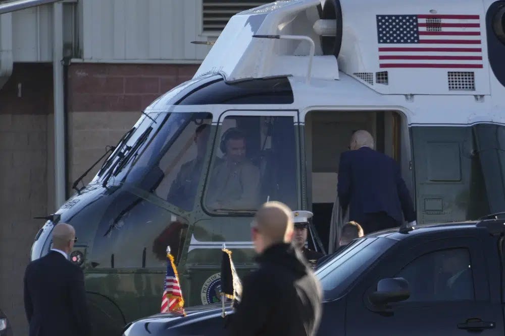 President Joe Biden boards Marine One at Delaware Air National Guard Base in New Castle, Del., Sunday, Jan. 8, 2023. (AP Photo/Carolyn Kaster)