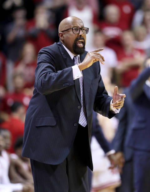 Mike Woodson the head coach of the Indiana Hoosiers gives instructions to his team against the Wisconsin Badgers at Simon Skjodt Assembly Hall on...