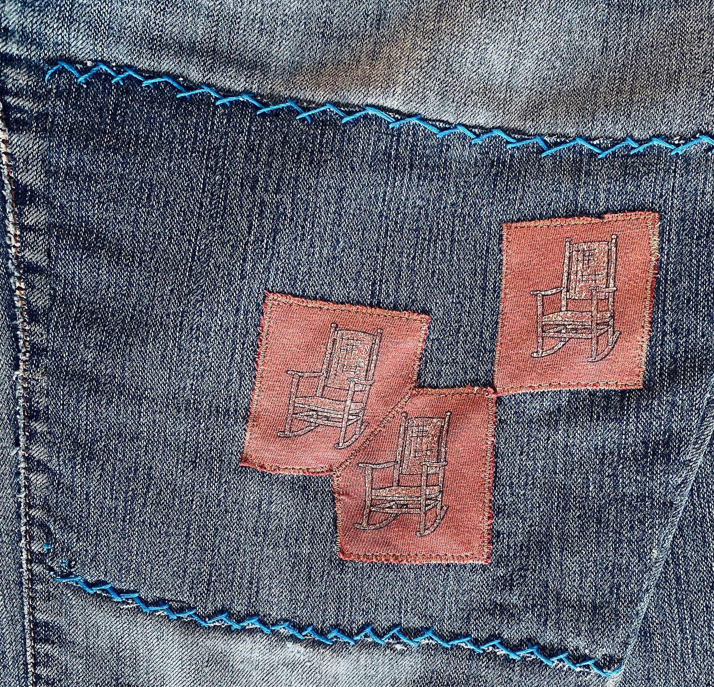 Patches and embroidery on an old pair of jeans.
