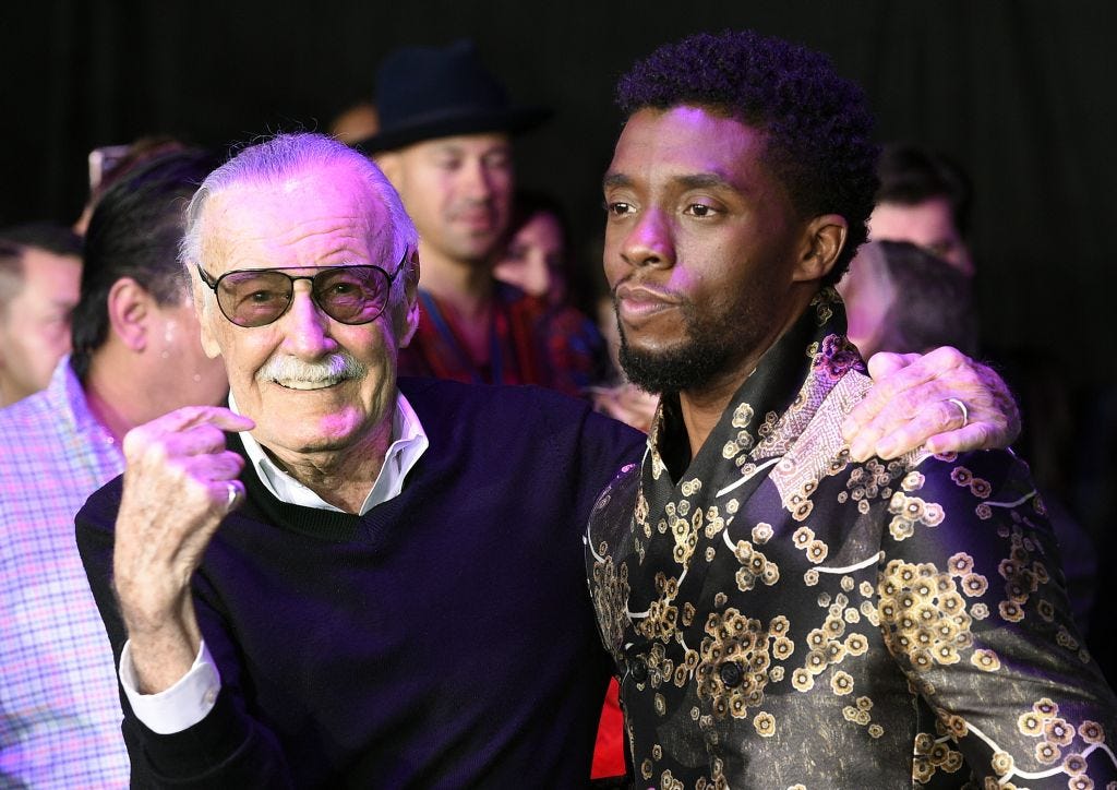 Stan Lee with black panther star Chadwick Boseman