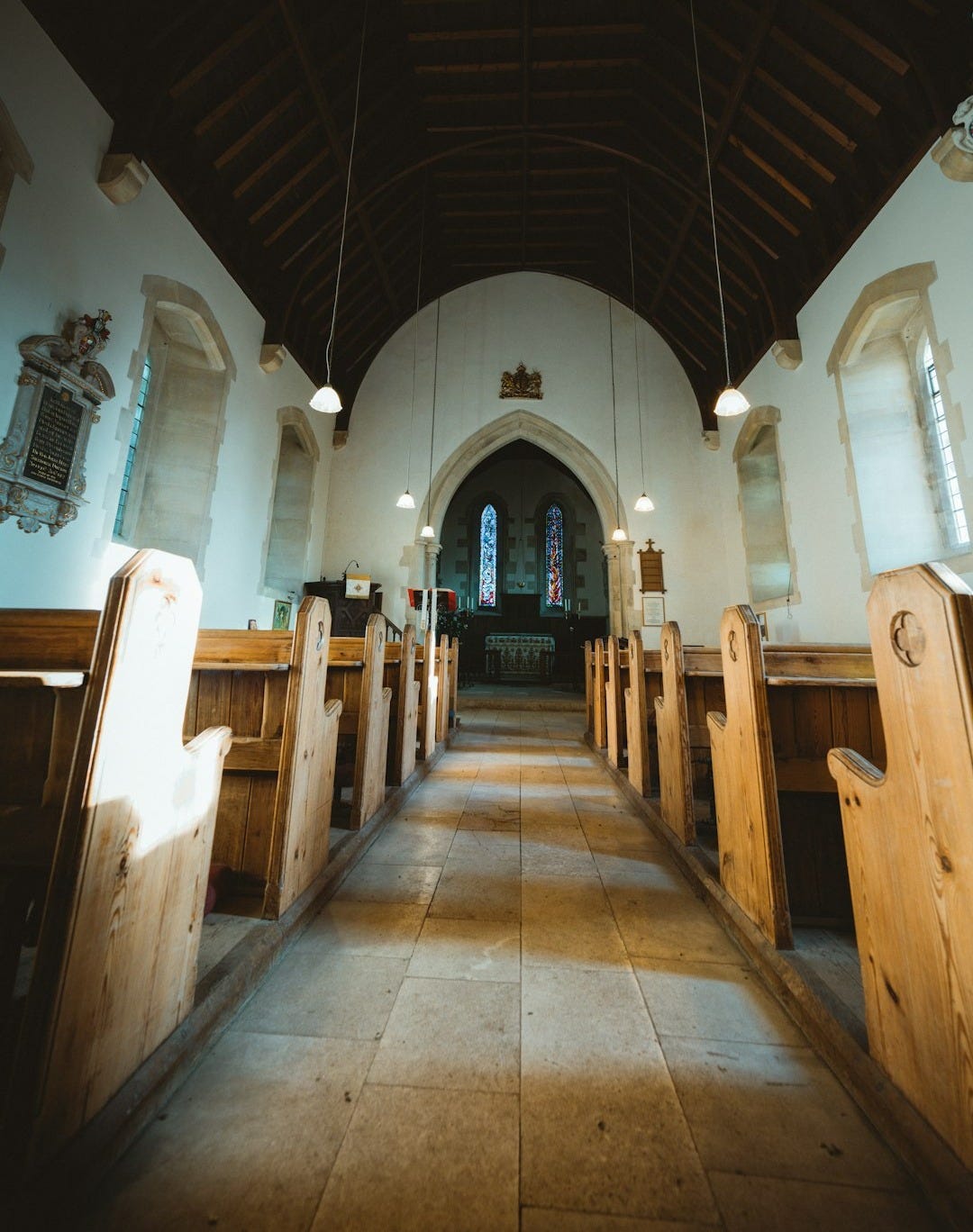 brown wooden chairs inside church brown wooden chairs inside church