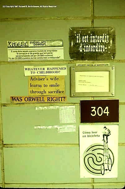 Images on the wall to the left of Dr. Wing's office door.