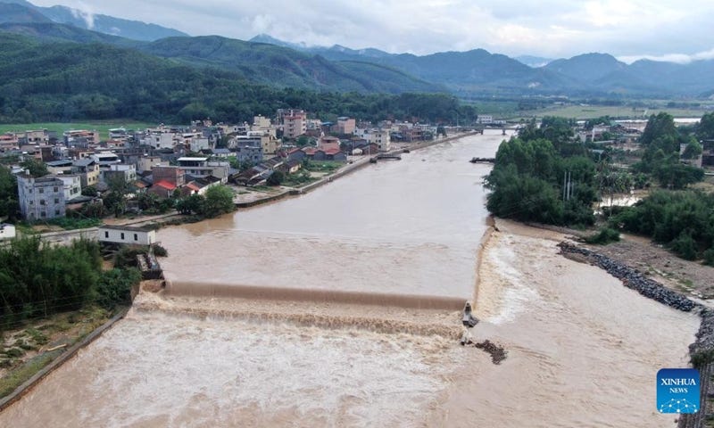 An aerial drone photo taken on April 21, 2024 shows a view of the Beijiang River tributary in Wujiang District of Shaoguan City, south China's Guangdong Province. A total of 38 hydrological stations at 24 rivers in south China's Guangdong Province have reported water levels surpassing the alert threshold as of 4 p.m. on Sunday, according to the provincial department of water resources. (Xinhua/Lu Hanxin)