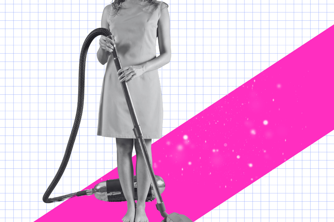 Woman with vacuum cleaner.