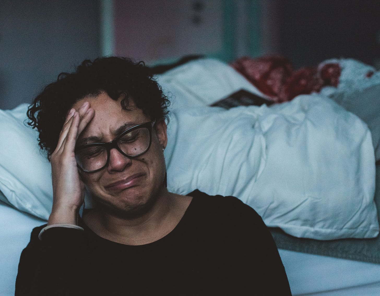 An image of a woman crying An image of a woman crying