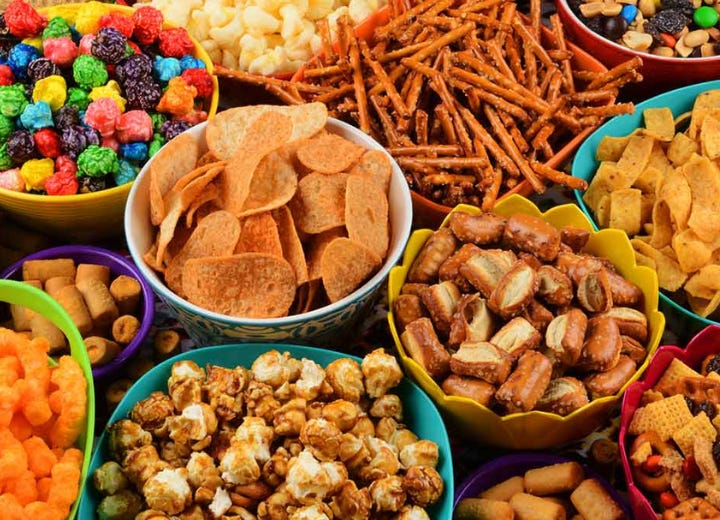 Ultra-processed foods are industrially manufactured items containing added sugars, fats, salts, artificial flavors, and preservatives. These include snacks, sodas, instant meals, and processed meats, often offering low nutritional value and contributing to health issues.