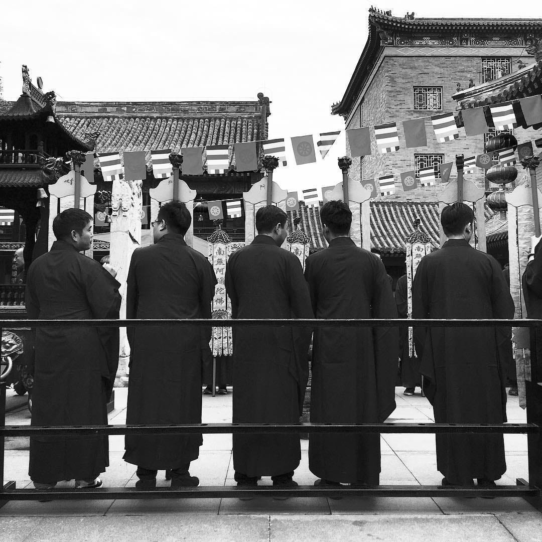 Buddhist monks at the Guanghua Temple in Beijing.