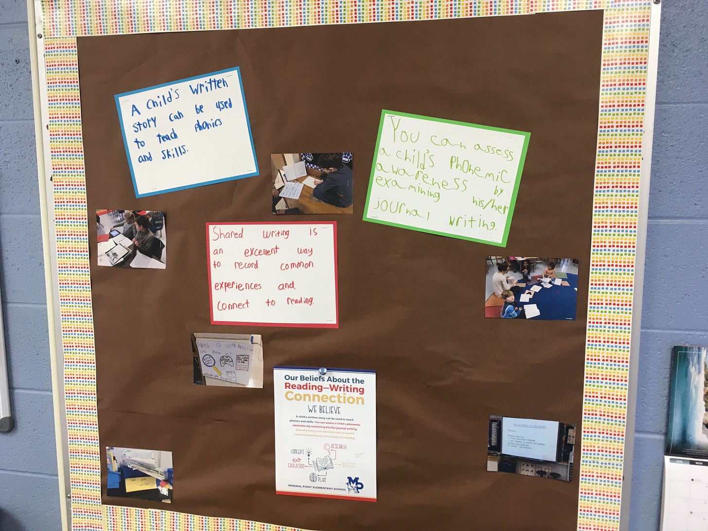 A bulletin board of literacy beliefs written by kids