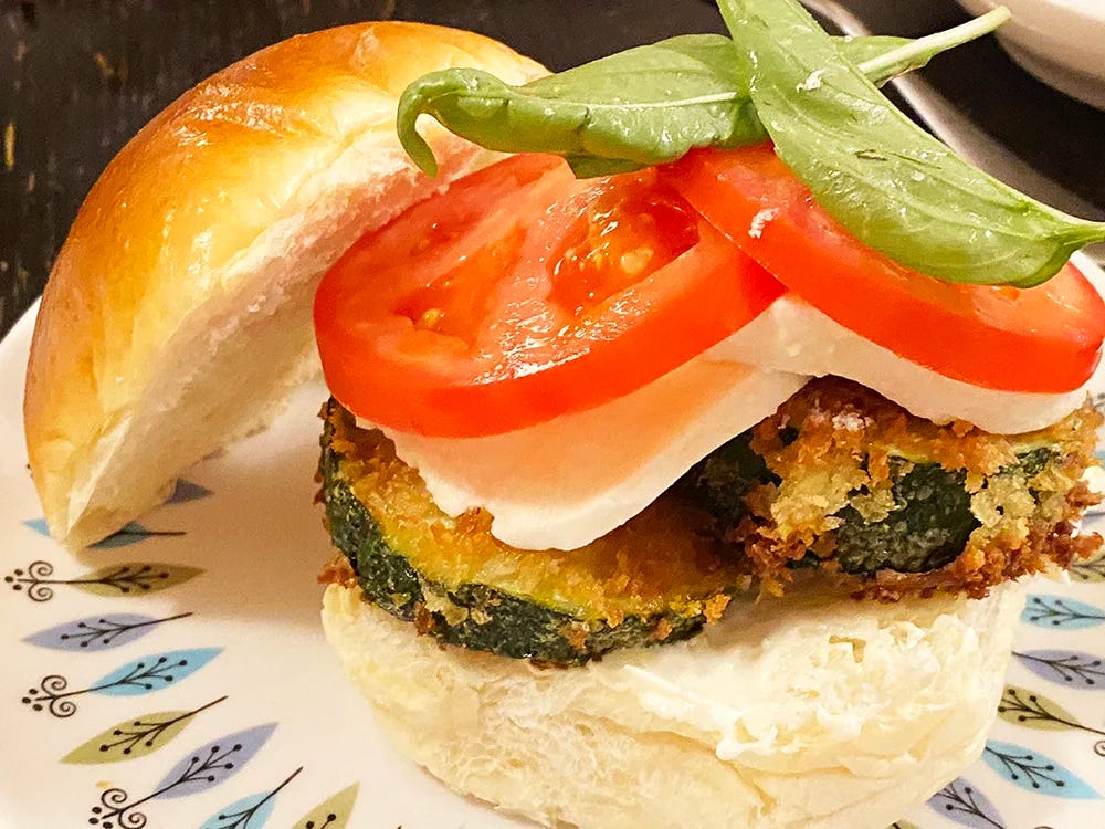 Soft roll layered with fried zucchini, mozzarella, tomato, basil and a bit of mayo