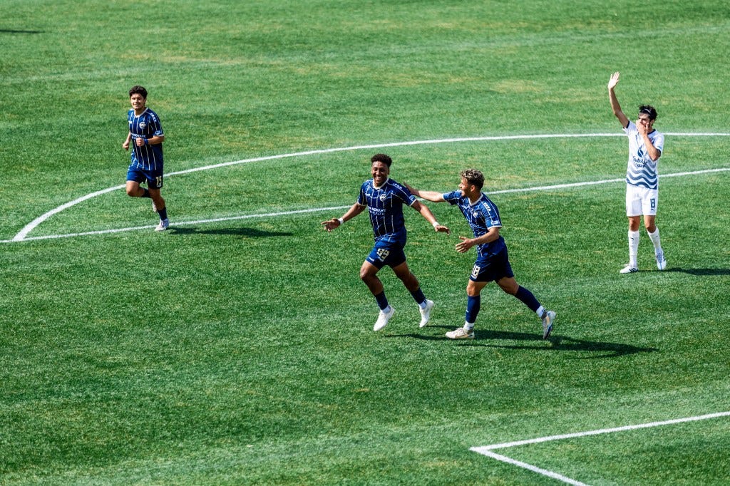 Christian Chaney celebrates his goal with teammates against South Georgia Tormenta FC