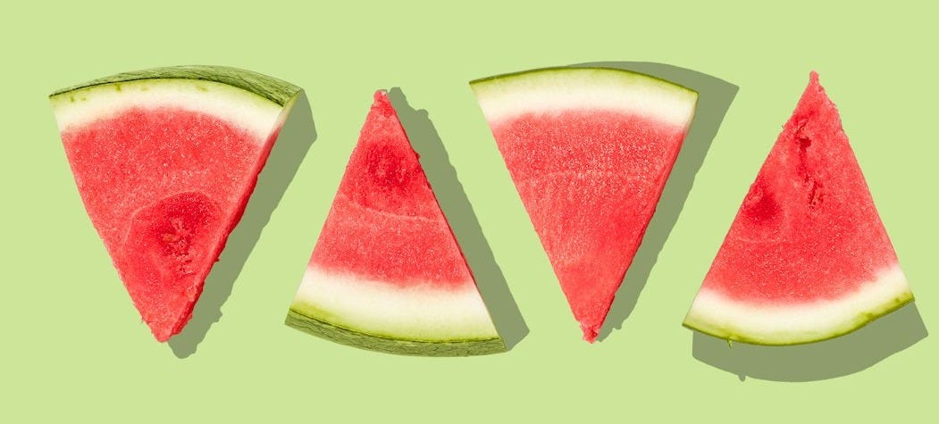sliced watermelon with green background sliced watermelon with green background