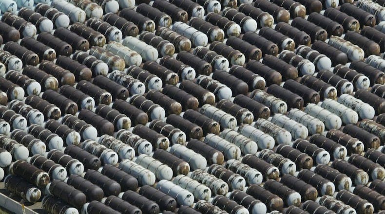The about 750 depleted uranium hexafluoride cylinders contained in the area photographed in 2006 accounted for not quite four-percent of the 20,000 stored at Piketon. Most of the cylinders weigh in at 14 tons. They are stored in outdoor yards at the U.S. Department of Energy’s Portsmouth Gaseous Diffusion Plant. About one-quarter were shipped in from the department’s former uranium enrichment plant in Oak Ridge, Tenn., and the rest accumulated over 50 years of uranium enrichment activities at Piketon. Many of the cylinders are covered in rust. The material is scheduled to be converted to a more benign form by Uranium Disposition Services LLC, under contract with the Energy Department. Staff photo by Chris Stewart