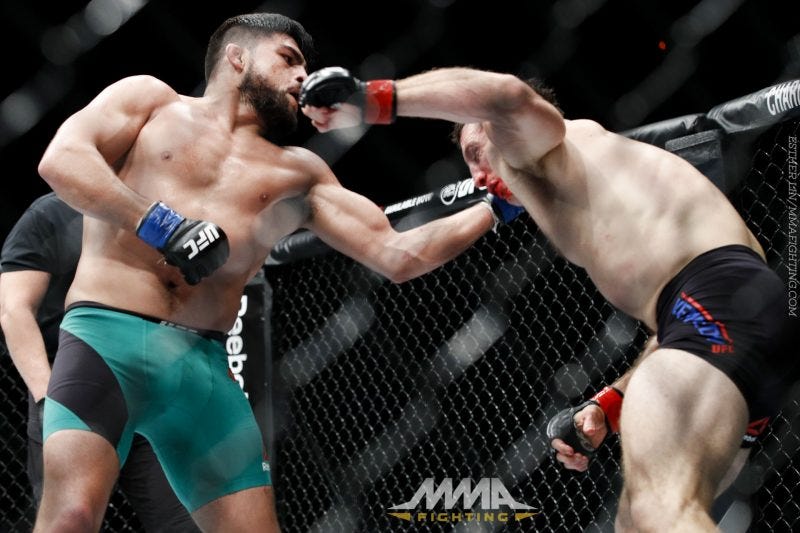 tim kennedy pummelled by kelvin gastelum