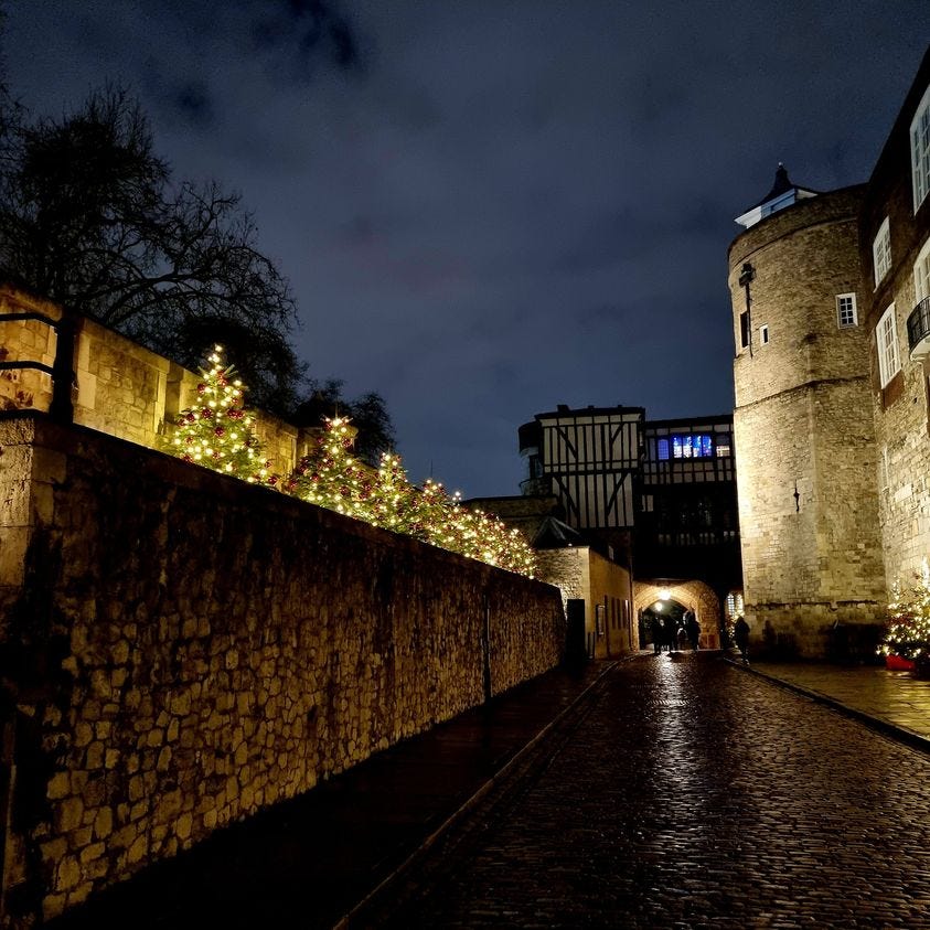 May be an image of 4 people, Bran Castle and the Tower of London