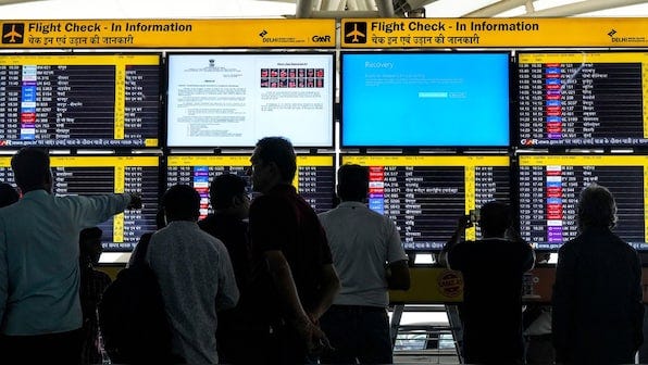 Handwritten boarding passes, manual-check ins: How airports in India are  managing Microsoft outage – Firstpost