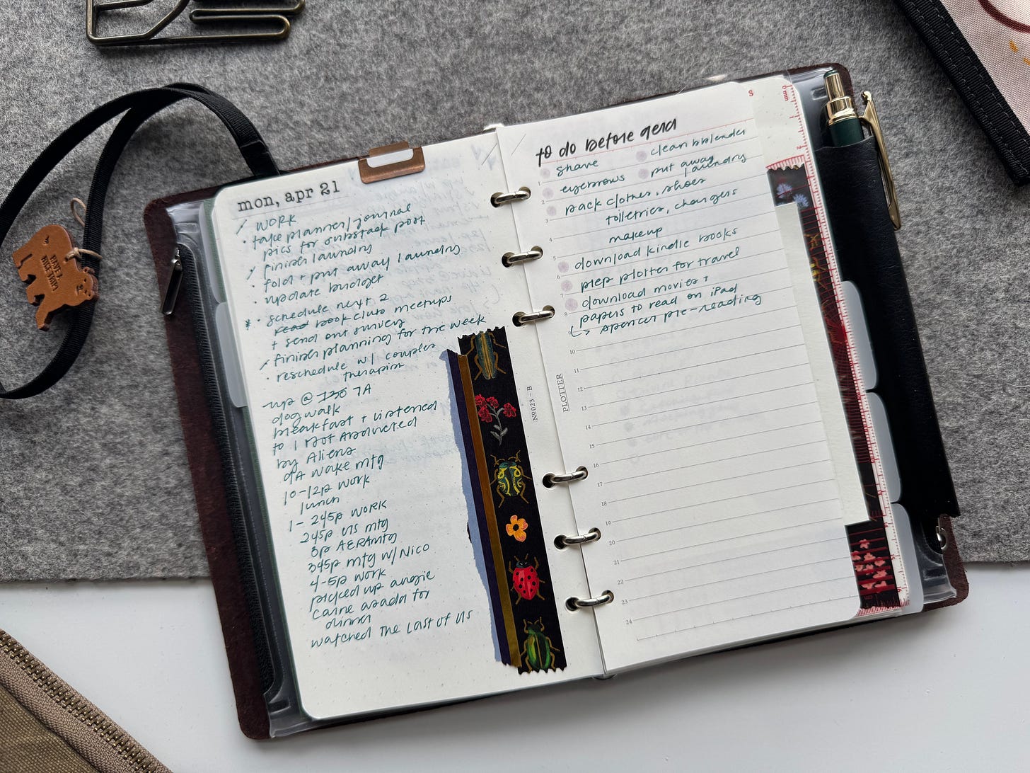 Bible size plotter binder open to page with daily to do list and notes (on the left) and a to do list for a conference (on the right).