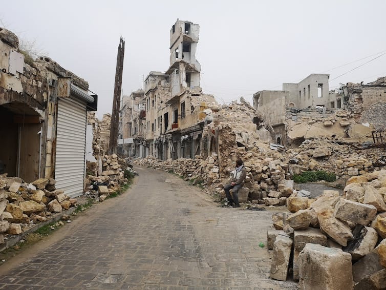 A city street that has been ruined by war.