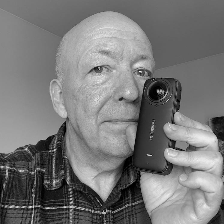 Picture of David Bell holding an Insta360 X3 camera