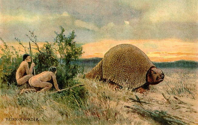 painting of two nude humans with spears, hiding behind a bush from a glyptodont, which is a giant relative of the armadillo. it's armored back looks similar to an enormoous tortoise 