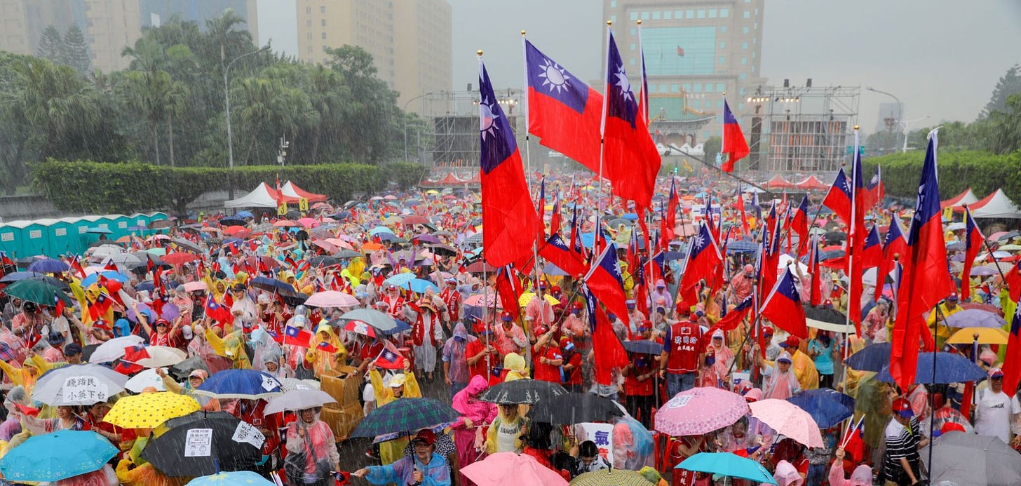 Supporters of Han Kuo-yu show their enthusiasm for the populist mayor of Kaohsiung City during a campaign event in Taipei on June 1, 2019.