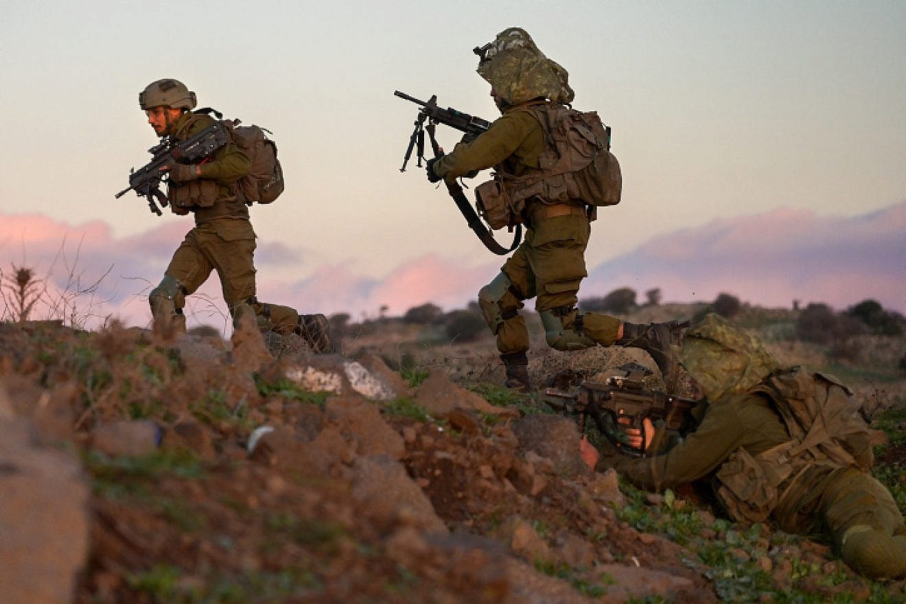 Soldiers from the IDF's Givati Brigade train near Kibbutz Merom Golan on the northern Golan Heights, Dec. 27, 2022. Photo by Michael Giladi/Flash90.