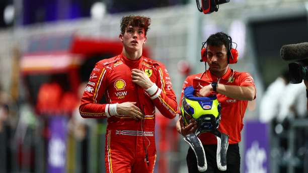 11th placed qualifier Oliver Bearman of Great Britain and Ferrari walks in the Pitlane during qualifying ahead of the F1 Grand Prix of Saudi Arabia...