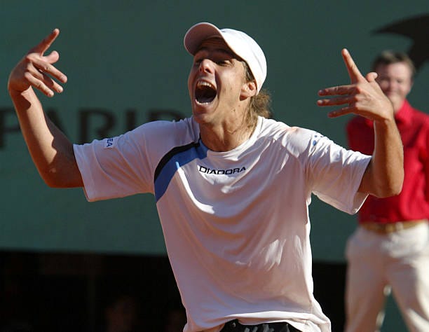 Gaston Gaudio becomes the first Argentine male to win a major title in 27 years, defeating Guillermo Coria 0-6, 3-6, 6-4, 6-1, 8-6