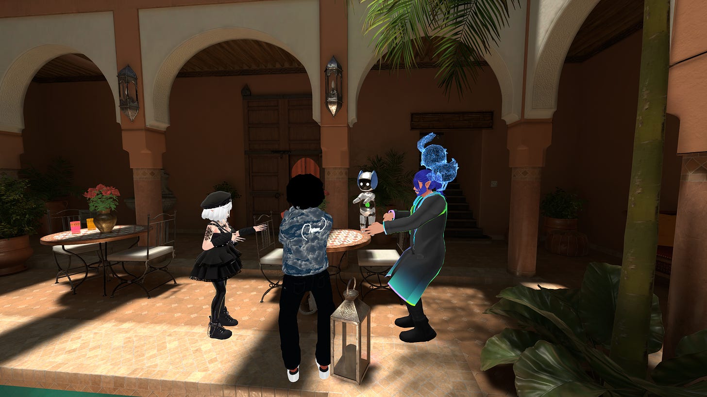 This is an image of some of the Glitches.VR collective members meeting with Mila to discuss the NHK documentary and questions about avatars.