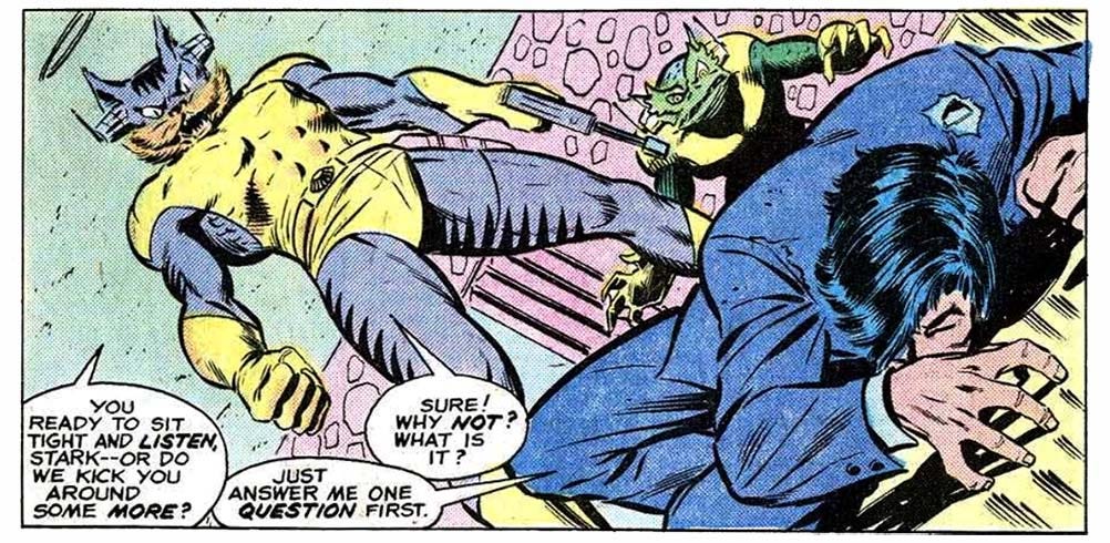 A panel from this issue showing Tony Stark lying on the floor, with the Ani-Men Cat-Man and Frog-Man standing over him. Cat-Man says, “You ready to sit tight and listen, Stark — or do we kick you around some more?” Stark says, “Just answer me one question first.” Cat-Man says, “Sure! Why not? What is it?”